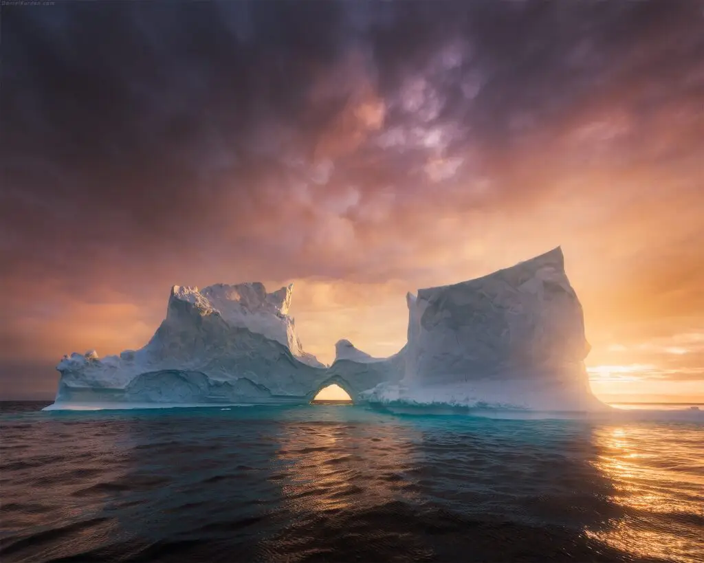 Kissing icebergs at sunset in Greenland