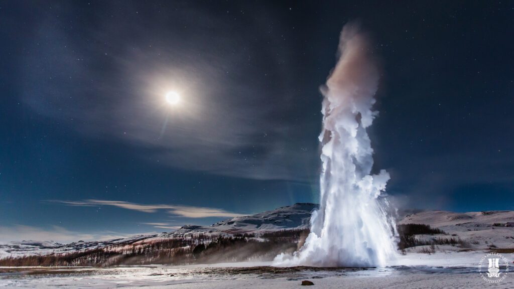 Strokkur Geysir erupting during Blue Hour in Iceland