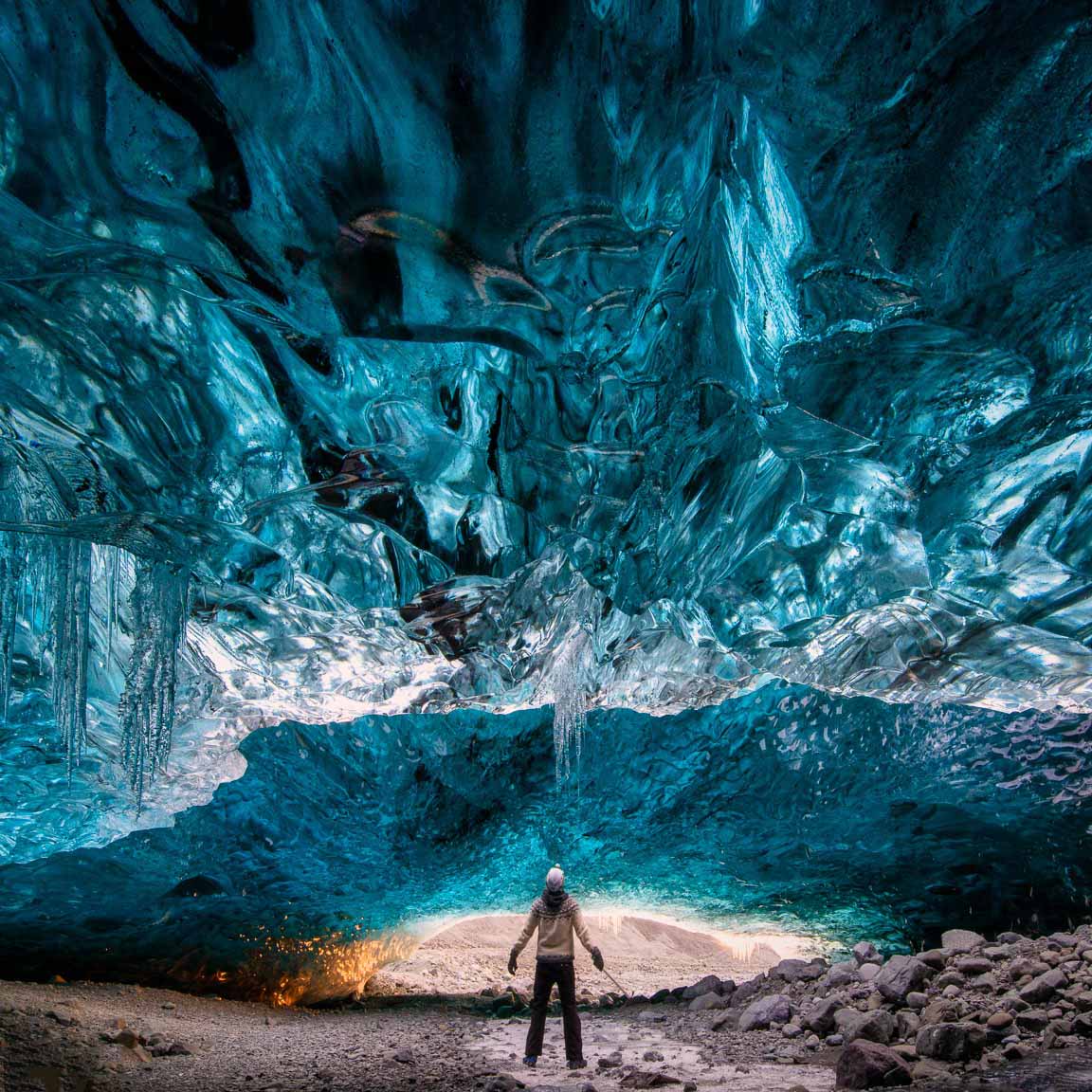 Man standing in Ice Cave in Iceland