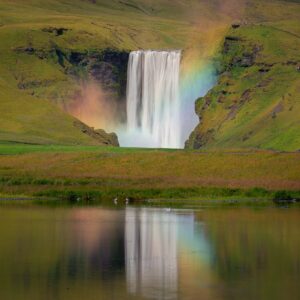 Rainbow reflection at Skogafoss Iceland