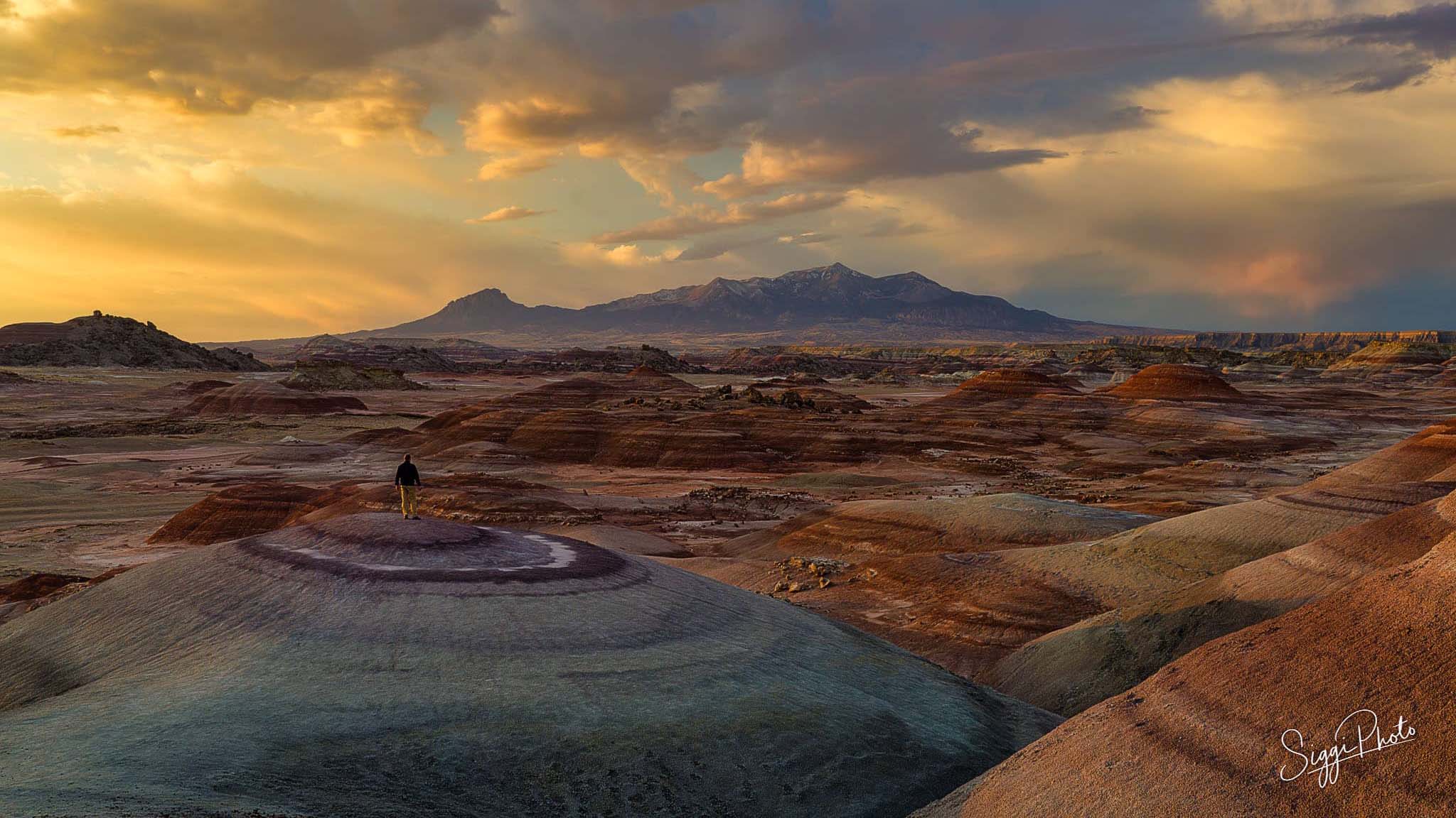 Sunset over the henry mountains in the Utah Badlands.